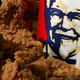 Illustration for article titled KFC Trinidad Getting Dragged for Celebrating Emancipation Day With a Chicken Drum-Black Fist Image Is So 2020